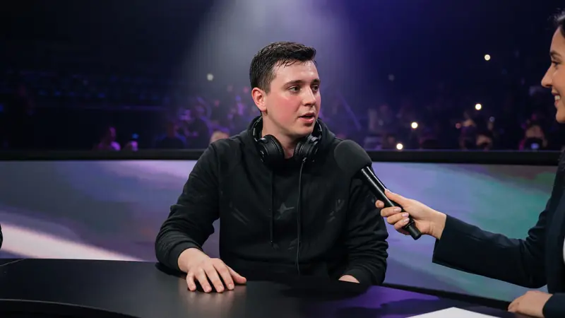 Post-match stage moment used as a calm editorial desk illustration